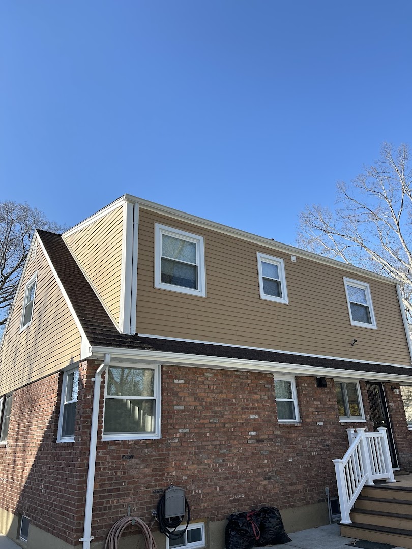 Clean home siding after soft washing, Long Island NY